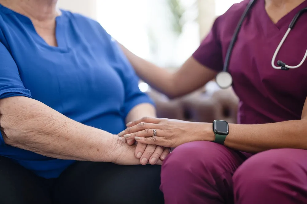 Caregiver providing support to an older adult