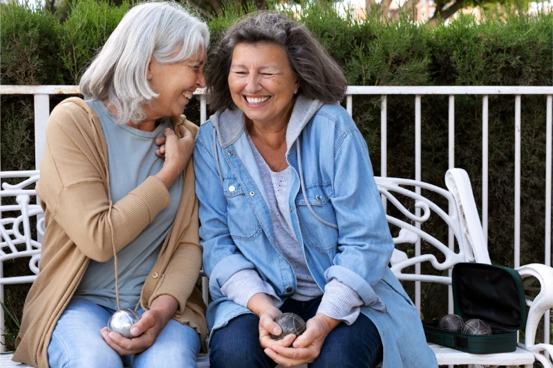 elderly friends playing games elderly friends playing games